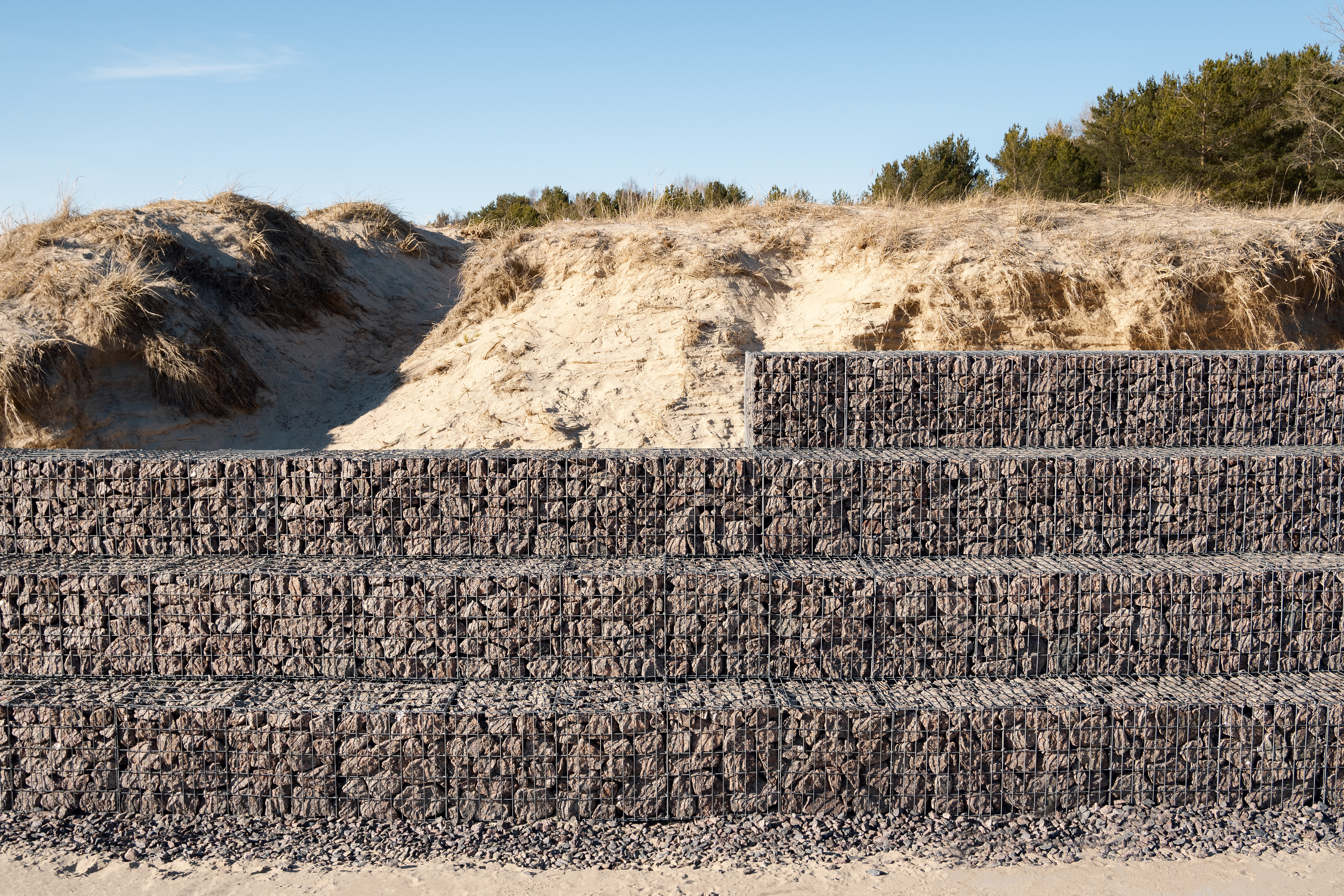 Gabion stone on sand bank