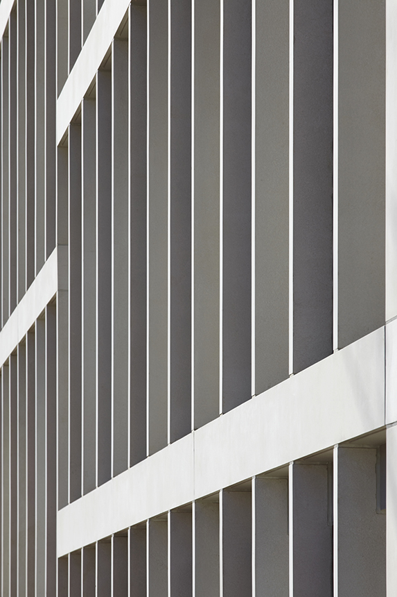 Detailed view of a house facade with parallel vertical structures
