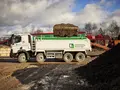 A Heidelberg Materials truck is parked at an industrial site.